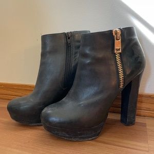 Black leather heeled booties. Size 6.5